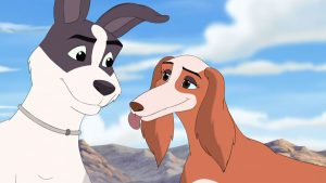 Maya the Dog about to give Jericho the Dog a kiss on the cheek.