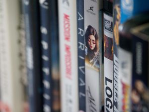 Various movie DVDs side-by-side.